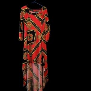 Va Va Voom Orange, Gold, & Black maxi dress.